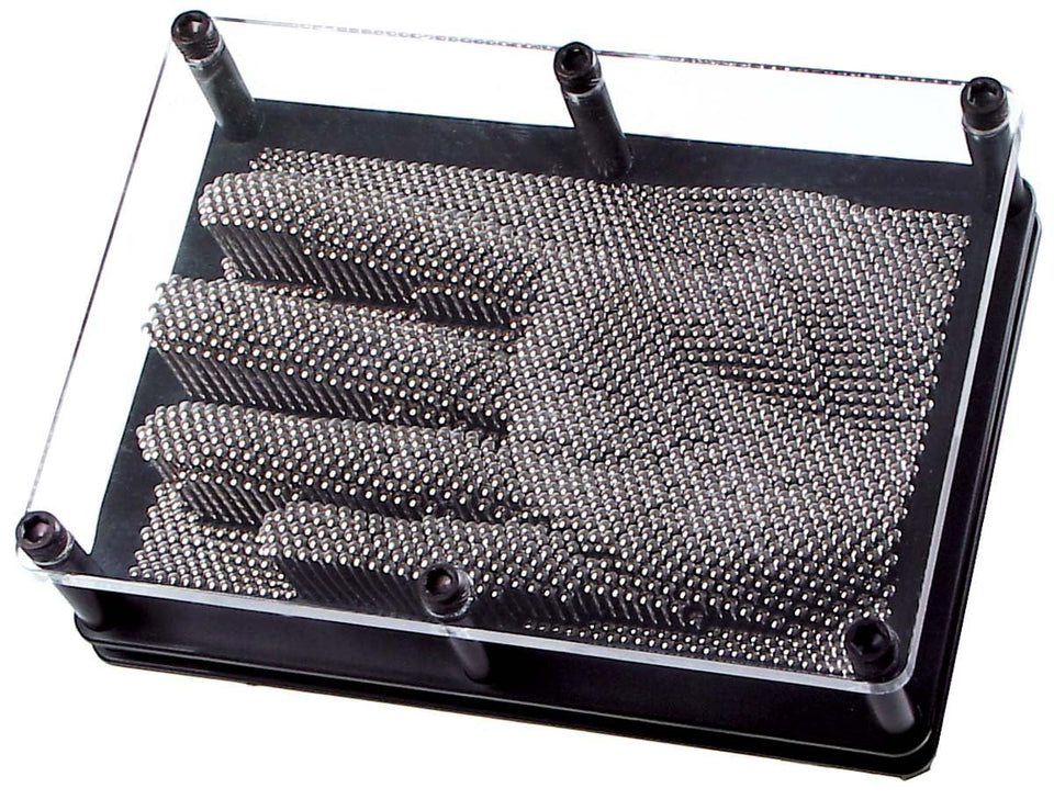 Toysmith Classic Pin Art frame displaying hundreds of movable pins forming a 3D image on a desk