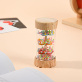 Toyssa wooden sensory set supports multi-sensory play for infants.