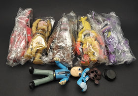 Toysvill six-piece set displayed near cake or cupcake decorations.