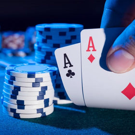 Trademark Poker built-in chip trays help organize stacks during play