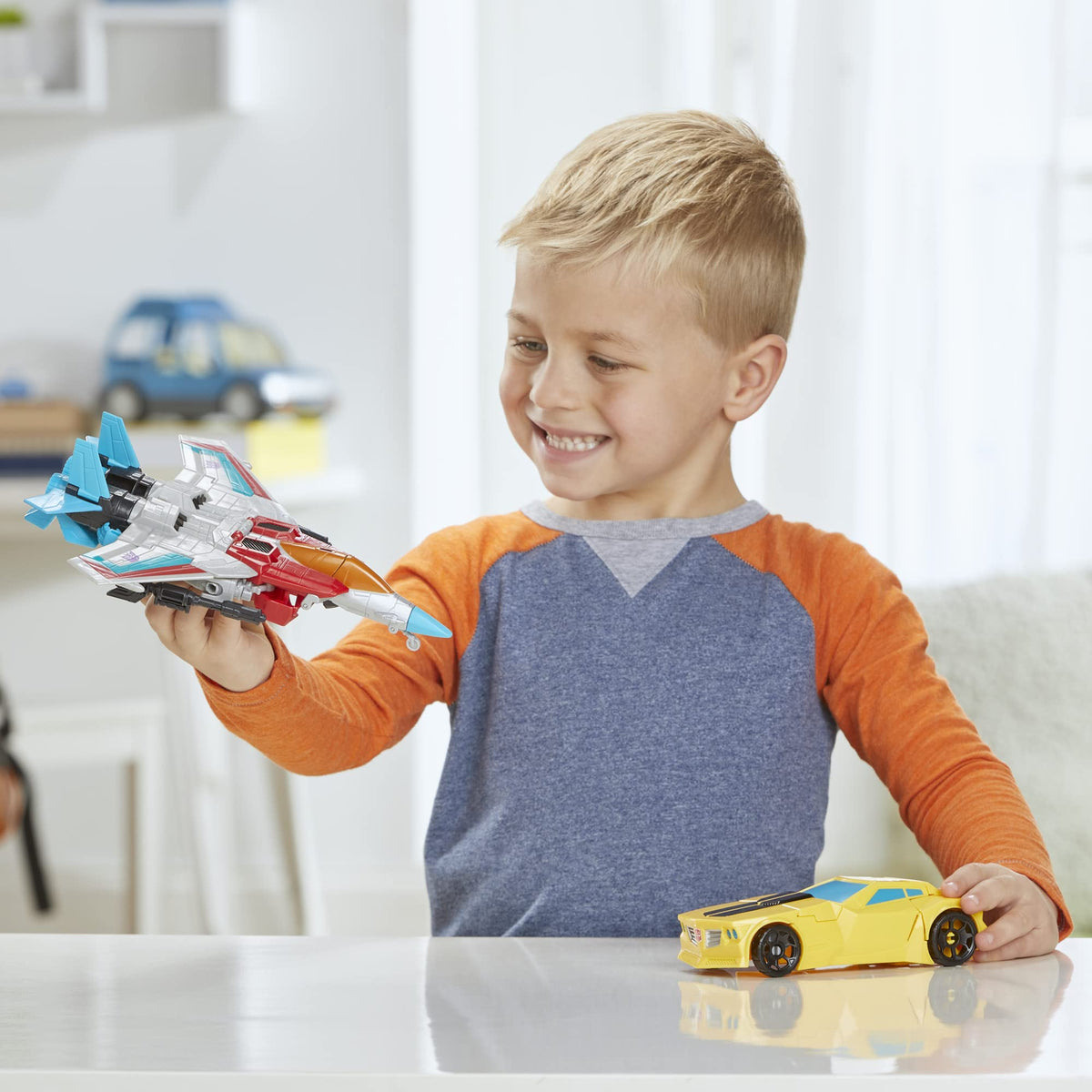 Transformers 2-in-1 conversion highlights emphasize simple steps for kids aged six and up.