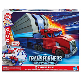 Transformers EarthSpark Optimus Prime trailer attached to battle station for imaginative battles.