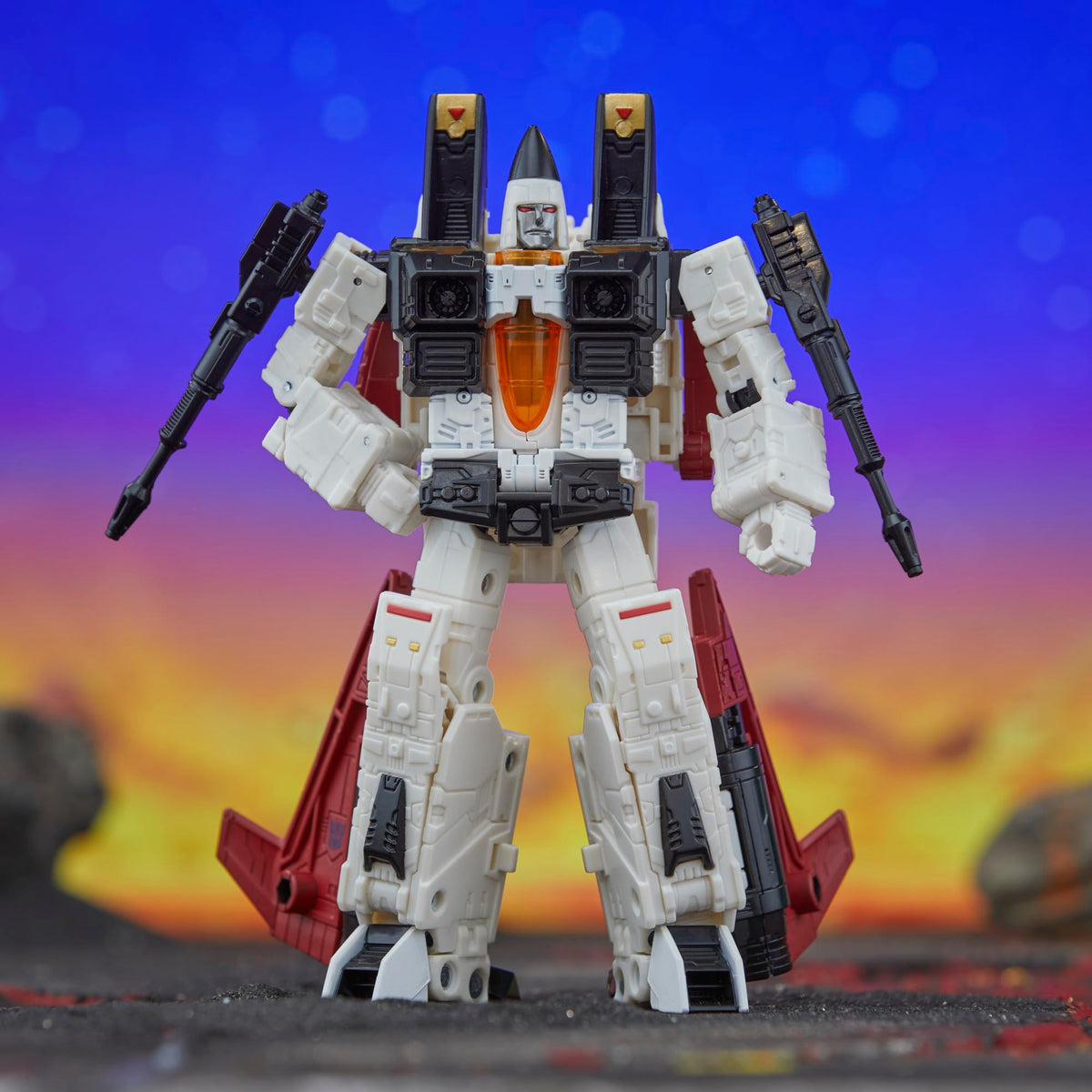 Transformers Legacy United Ramjet with blaster attached in robot mode.