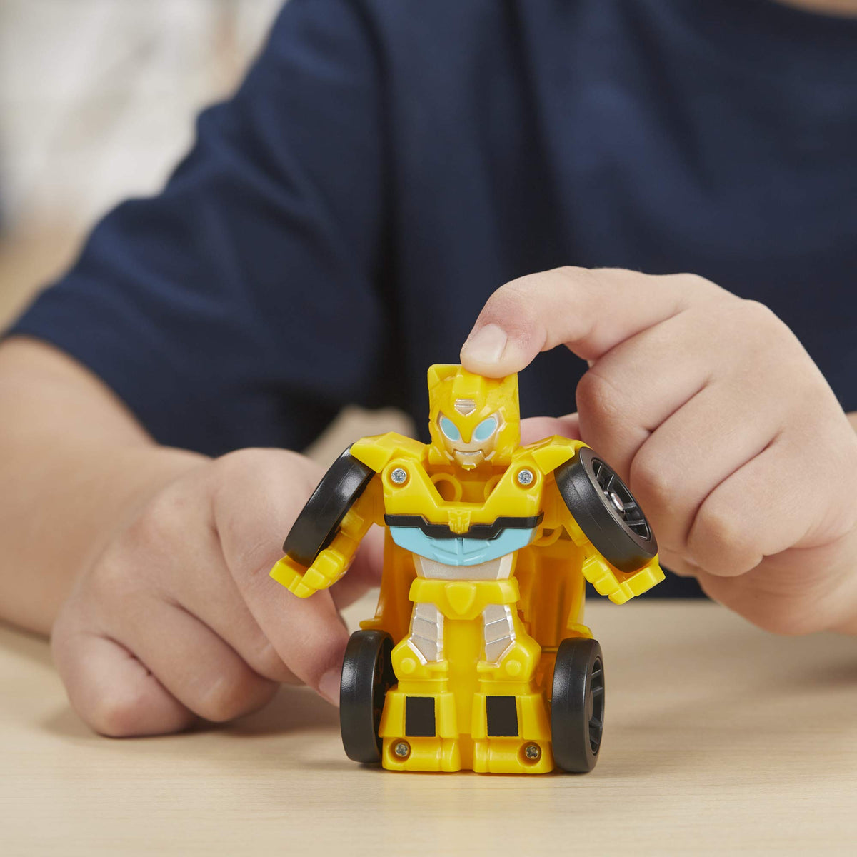 Transformers Rescue Bots Hot Shot mini bot racer in dual modes supports creative play.