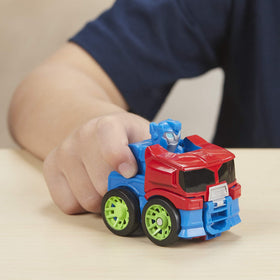 Transformers Rescue Bots Academy playmat features race-track visuals for heroic missions.