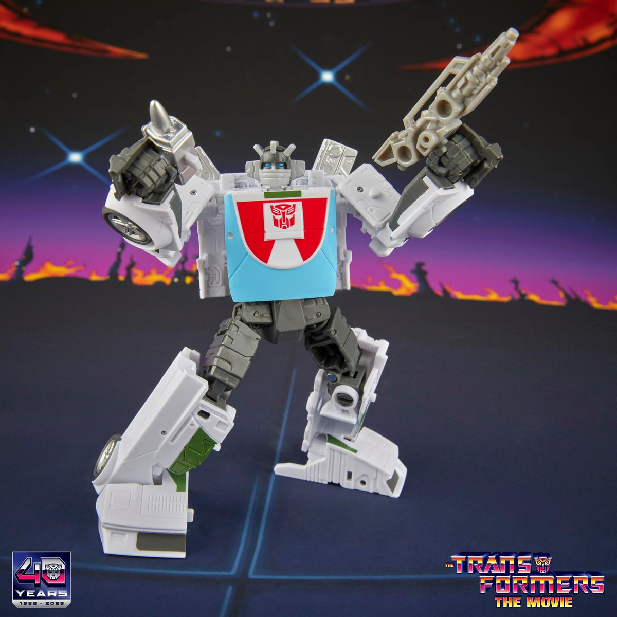Wheeljack blaster accessory attached for authentic action posing.