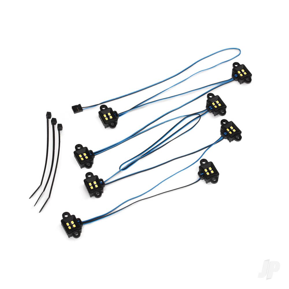 Traxxas 8026X LED rock light kit on TRX-4 front view enhances off-road visibility.