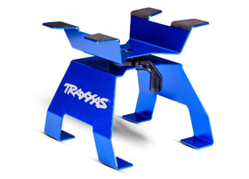 Traxxas 8797 blue X-Truck Stand helps prevent tire flat-spotting.