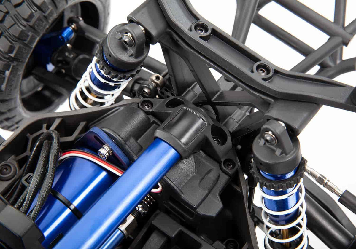 Traxxas blue chassis brace close-up highlighting color accent for easy identification