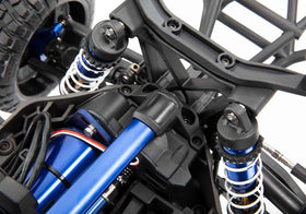 Traxxas blue chassis brace close-up highlighting color accent for easy identification
