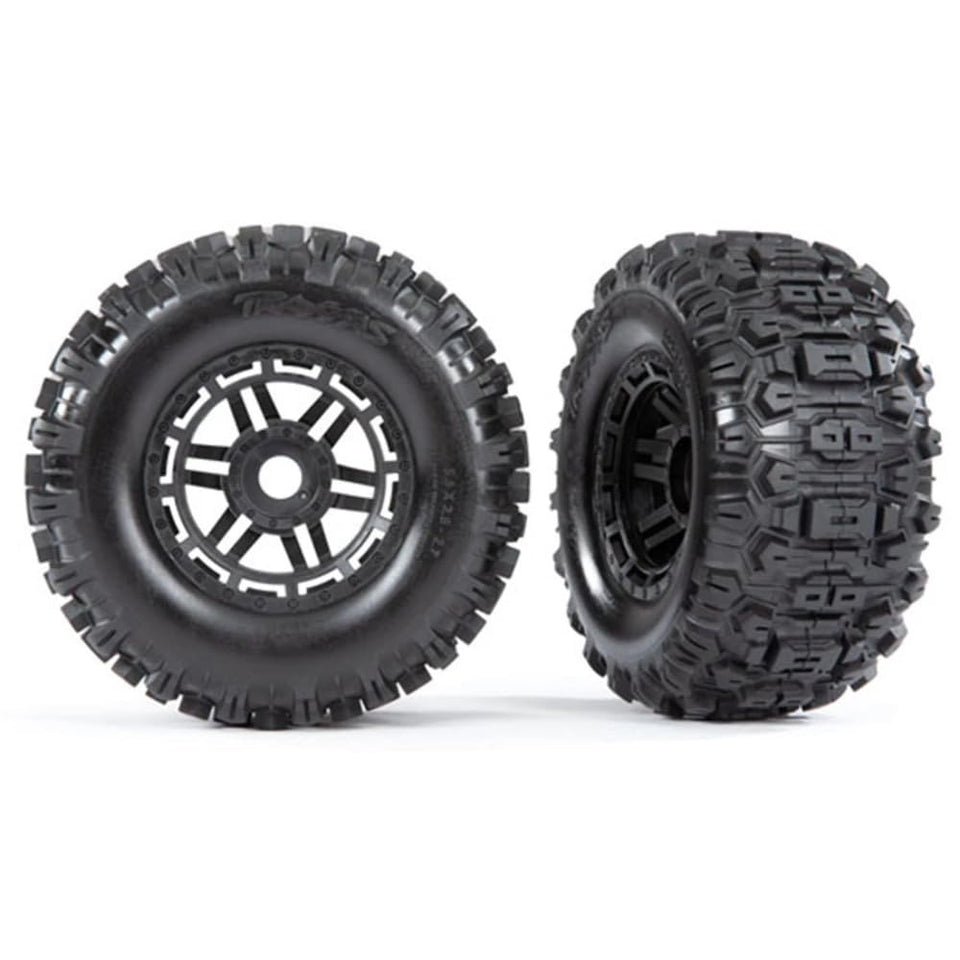Traxxas Sledgehammer tires on black 2.8-inch wheels boost off-road traction.