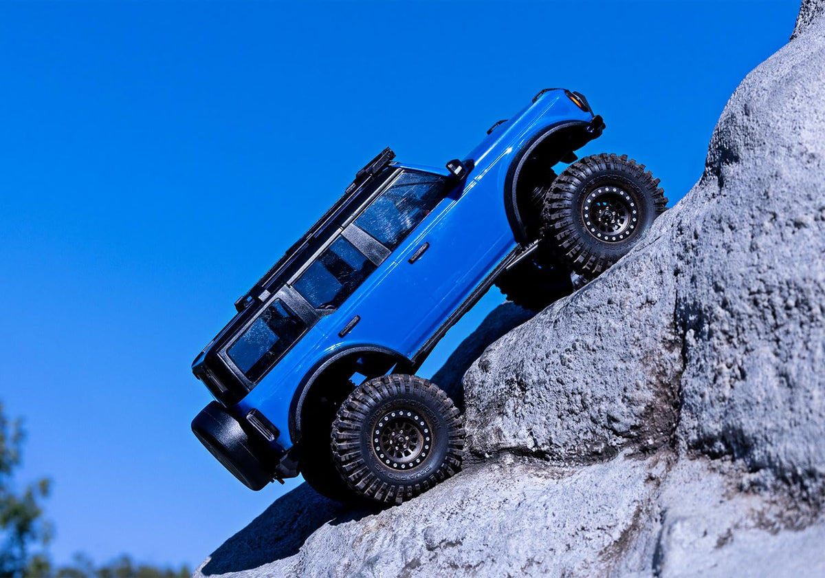 Traxxas TRX-4M brushless system delivers smooth power for crawler adventures.