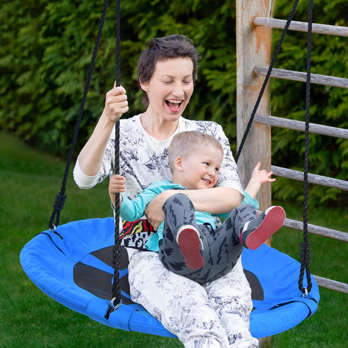 Trekassy tree swing strap and carabiner system for quick, secure installation.