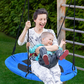 Trekassy tree swing strap and carabiner system for quick, secure installation.