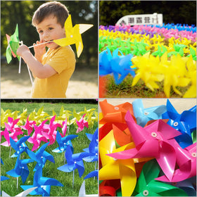 Dark purple Tsocent pinwheels add bold garden accents.