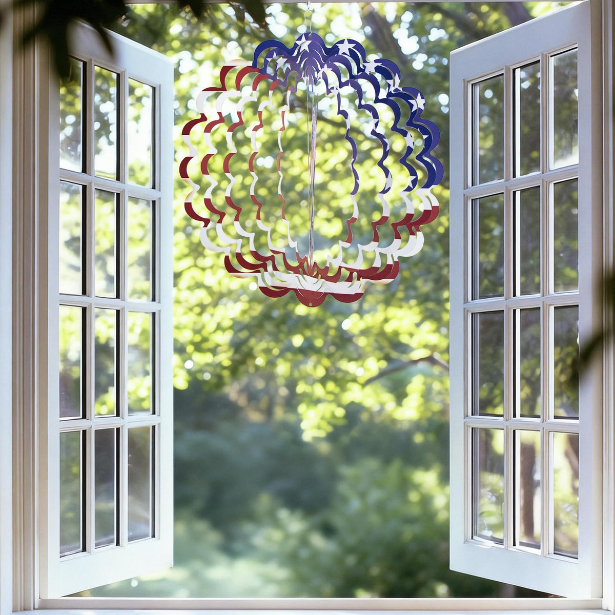 TT-MM Bigfoot wind spinner with American flag motif for outdoor display.