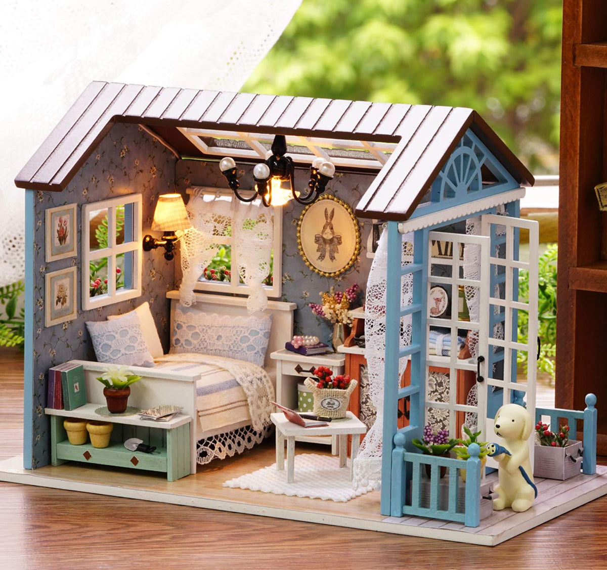 TuKIIE dollhouse interior reveals realistic furniture details.