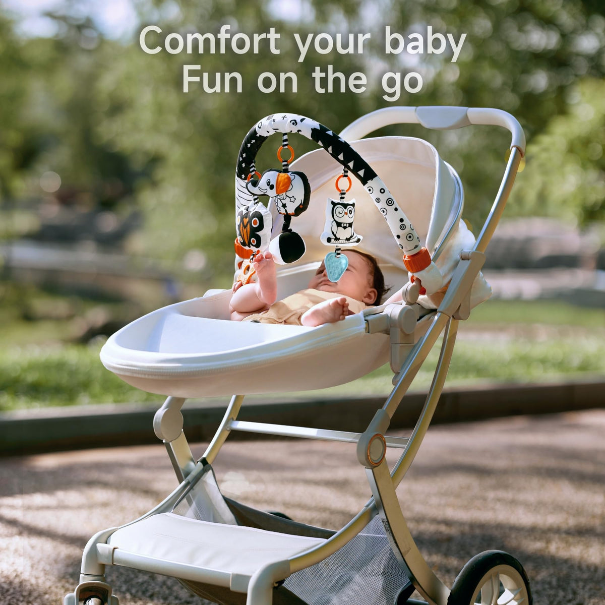 Tumama flexible clip-on arch secures toys to strollers or cribs for on-the-go play.