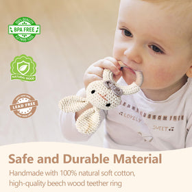 Tuowita newborn rattle with wooden teether ring shown in warm beige tones.