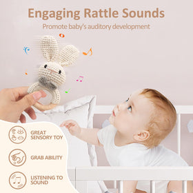 Tuowita rattle demonstrates newborn-friendly grip and gentle sound for playtime.