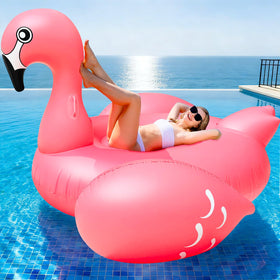TURNMEON 102-inch flamingo float fully inflated, ideal for pool lounging and group fun.