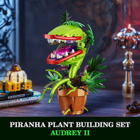 Tweandar Audrey II mouth-open action shot highlights movable maw for dynamic display.