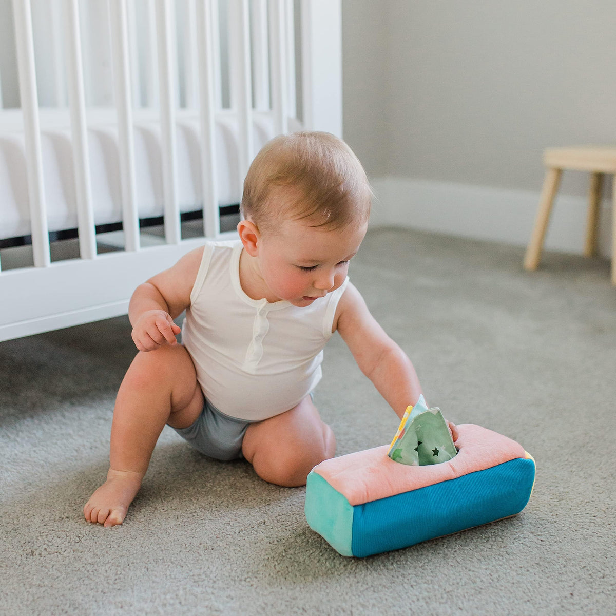 Twiddler Toys pull and replace activity fosters fine motor skills.