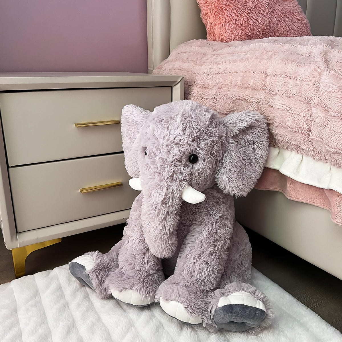 Soft UBABER elephant toy for kids in gray ready for bedtime