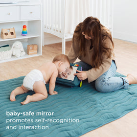 Ubbi Mirror Me Cube crinkle flap area enhances auditory and tactile exploration