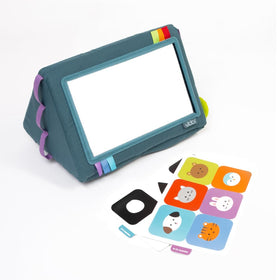 Ubbi Mirror Me Cube mirror side promotes self-recognition during tummy time and play