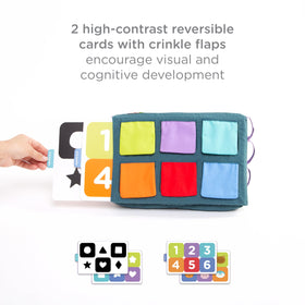 Ubbi Mirror Me Cube ribbon accents support color learning and coordination