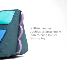 Ubbi Mirror Me Cube soft pocket provides extra storage during play