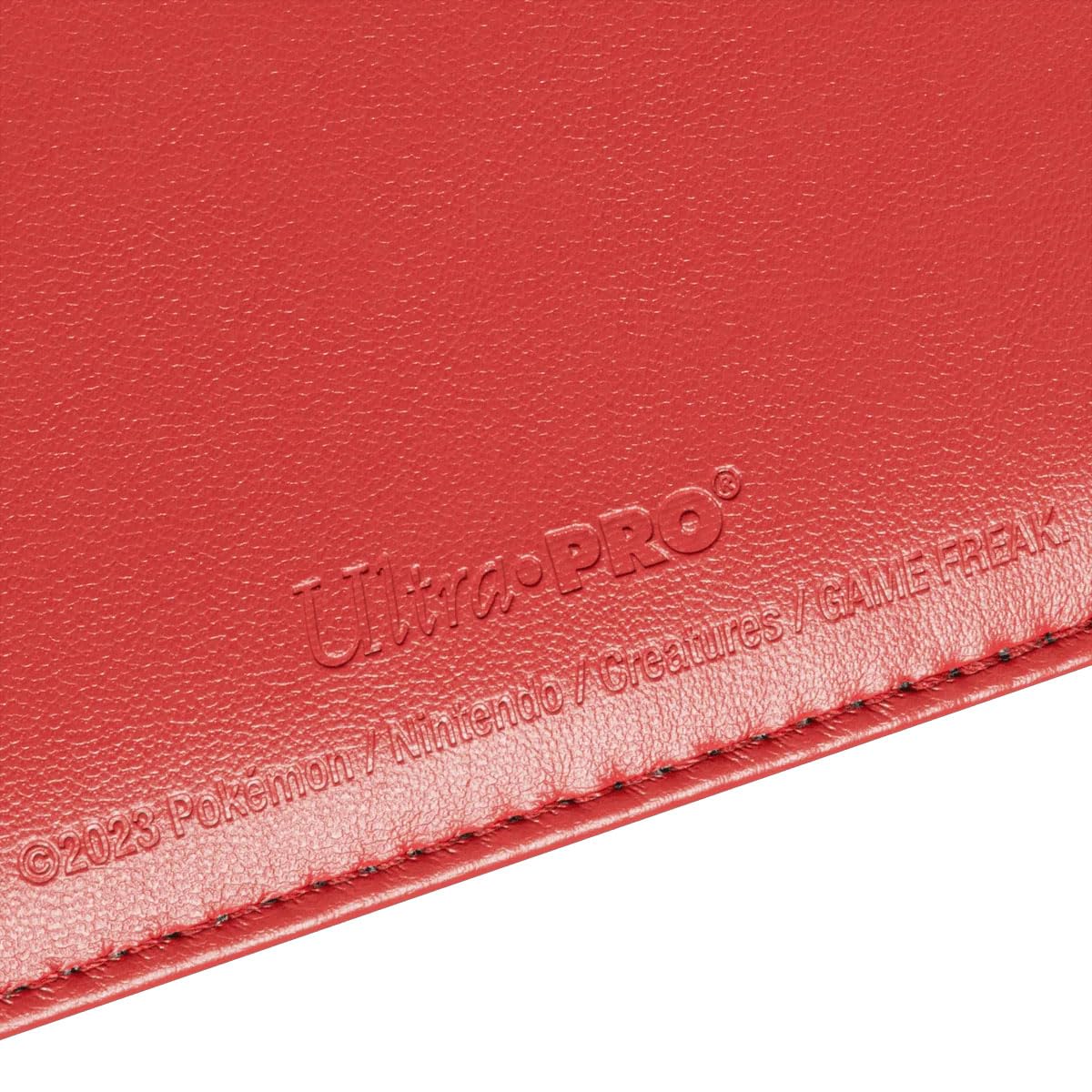 Binder interior with side-loading pages and black backing for card separation