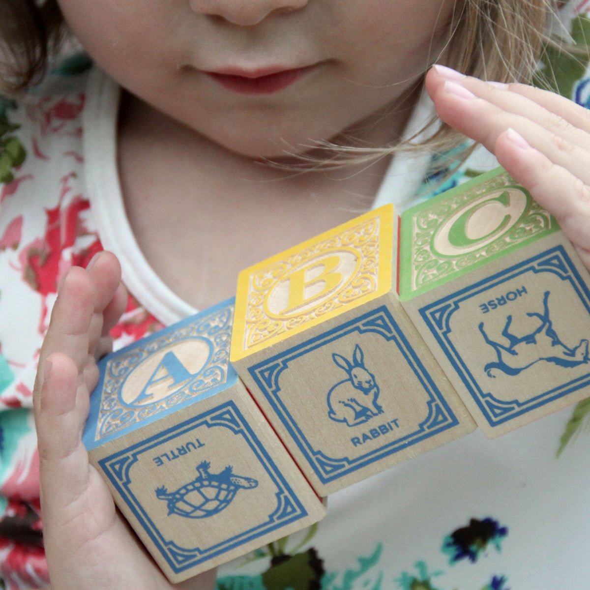 Uncle Goose Classic ABC Blocks featuring embossed animal designs