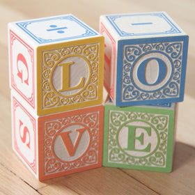Uncle Goose Classic ABC Blocks in a pile for stacking play