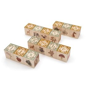 Uncle Goose Watercolor ABC Blocks uppercase letters emerging from paint-washed backgrounds