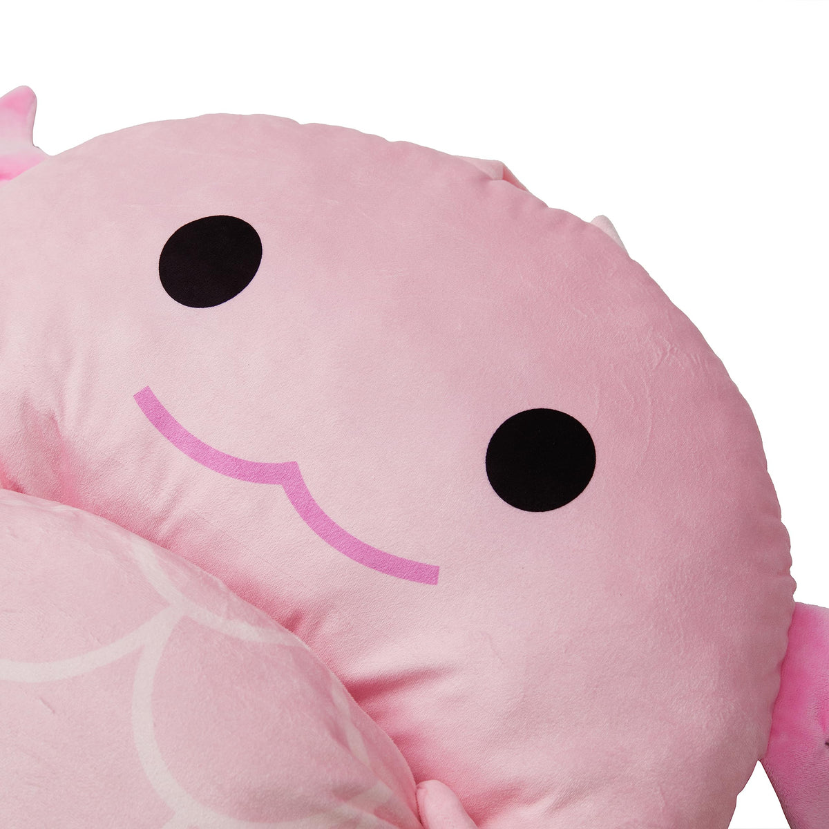 Nap Buddy Axolotl sleeping bag on a kid bed used for comfort