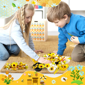 Unvola bee plastic tweezers enhance grip and independent play.