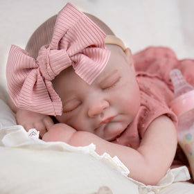 UOFTKIZ twenty-inch doll for easy holding and on-the-go play