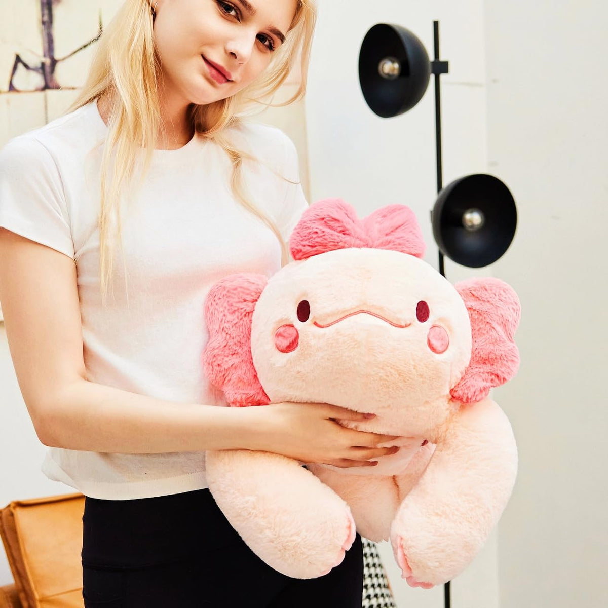 The uoozii 20 pink axolotl provides bedtime comfort for winding down.