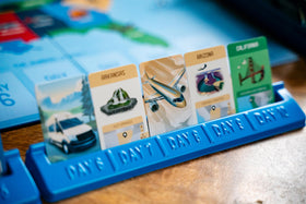 USAopoly 10 Days in the USA airplane cards ready for strategic routing.