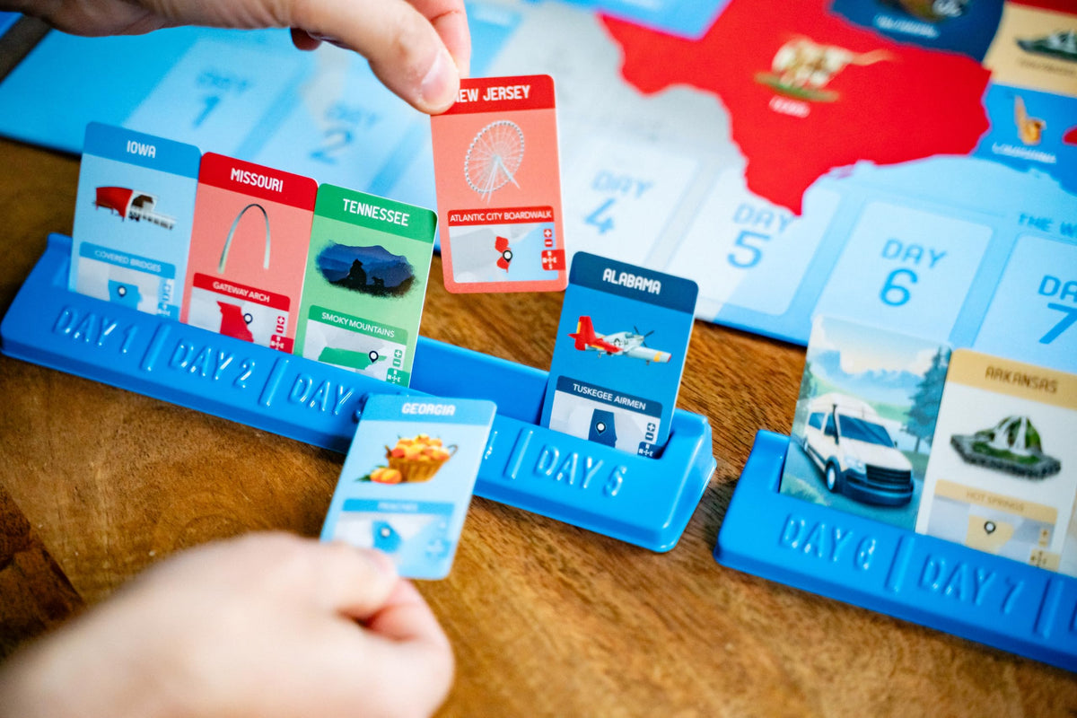 USAopoly 10 Days in the USA car cards guiding route connections.