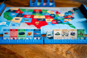 USAopoly 10 Days in the USA destination tiles in action for planning.