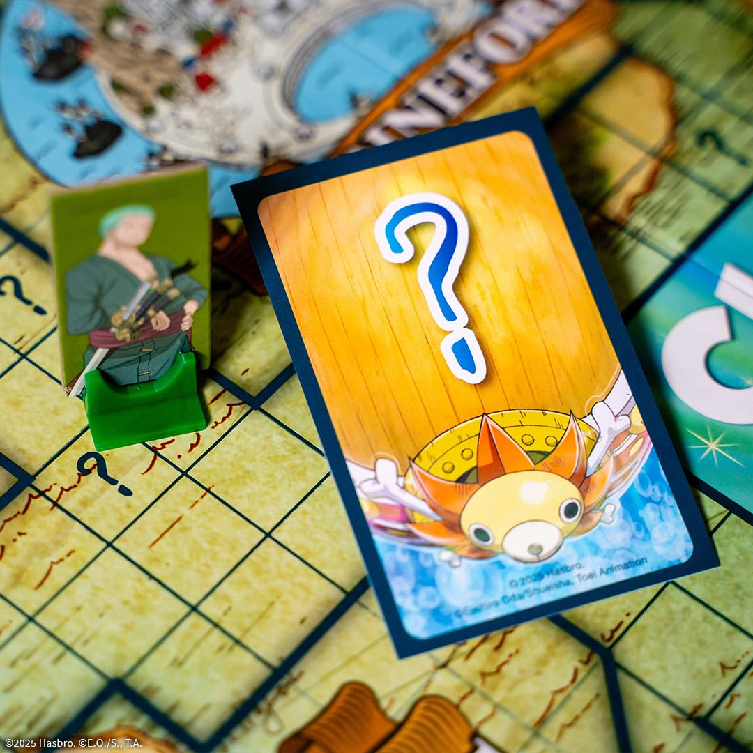 USAOPOLY CLUE One Piece dice and tokens ready for a treasure-hunt night.