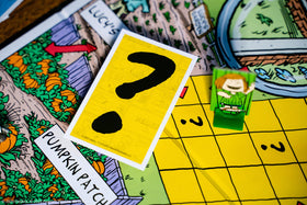 USAOPOLY CLUE Peanuts Linus Blanket close-up hints at the mystery