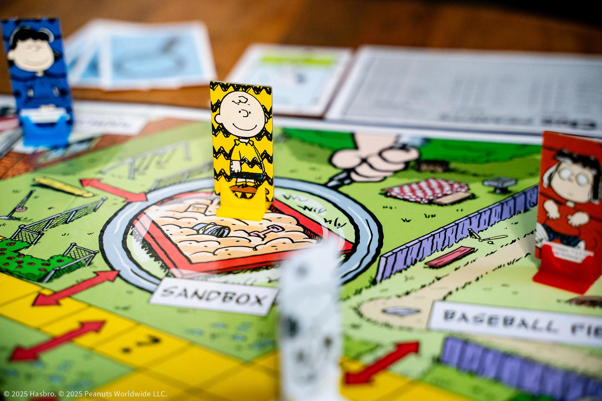 USAOPOLY CLUE Peanuts Snoopy image highlights playful investigative moments