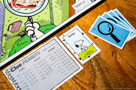 USAOPOLY CLUE Peanuts Family game setup supports lively 2-6 player nights