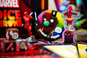 USAOPOLY Deadpool action cards enable ability upgrades and tense decisions.