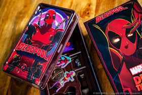 USAOPOLY Deadpool box-art emphasizes licensed Marvel appeal and premium packaging.