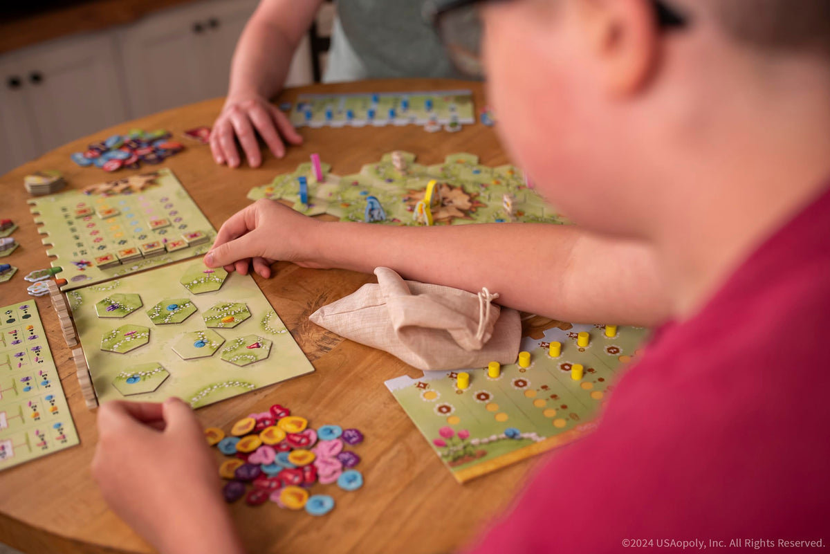 USAOPOLY Gnome Hollow board setup showing magnetic boards for smooth play.